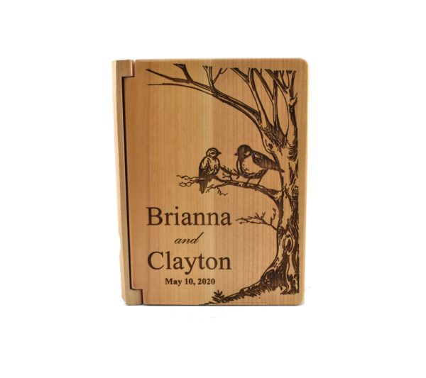 Personalized three ring wooden photo album.