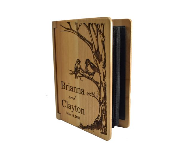 Personalized three ring wooden photo album.