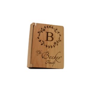 Personalized three ring wooden photo album.