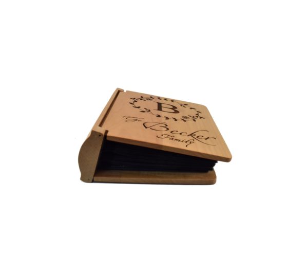 Personalized three ring wooden photo album.