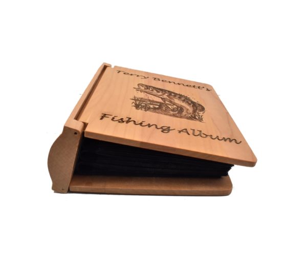 Personalized three ring wooden photo album.