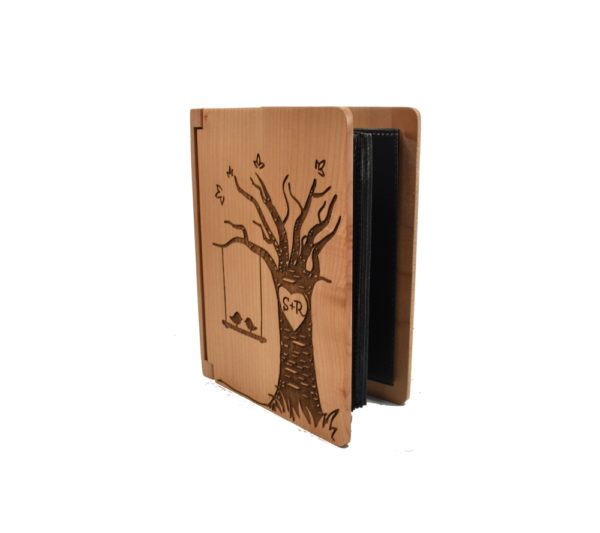 Personalized three ring wooden photo album.