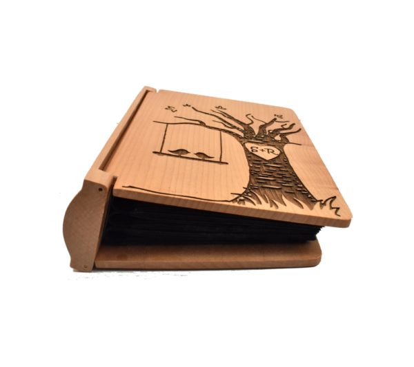 Personalized three ring wooden photo album.