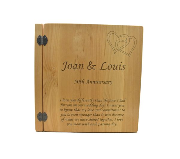 Custom engraved three ring photo album.