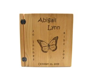 Personalized three ring wooden photo album.