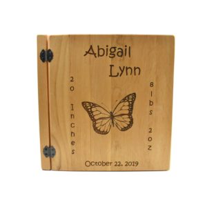 Personalized three ring wooden photo album.