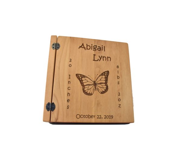 Personalized three ring wooden photo album.