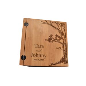 Personalized three ring wooden photo album.