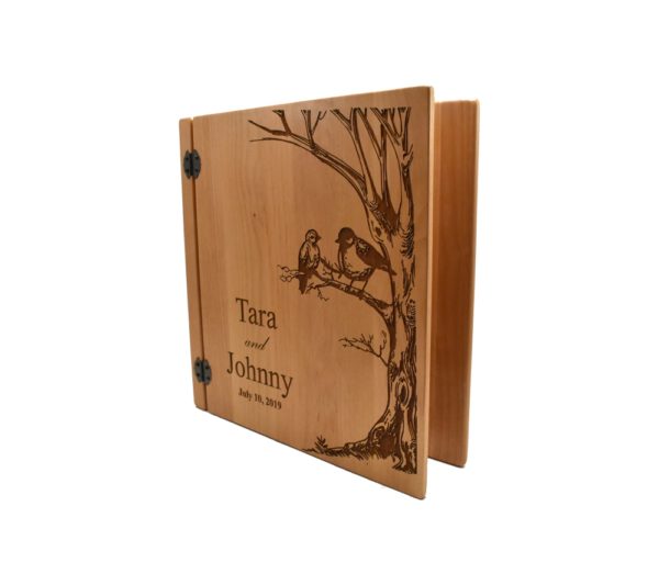 Personalized three ring wooden photo album.