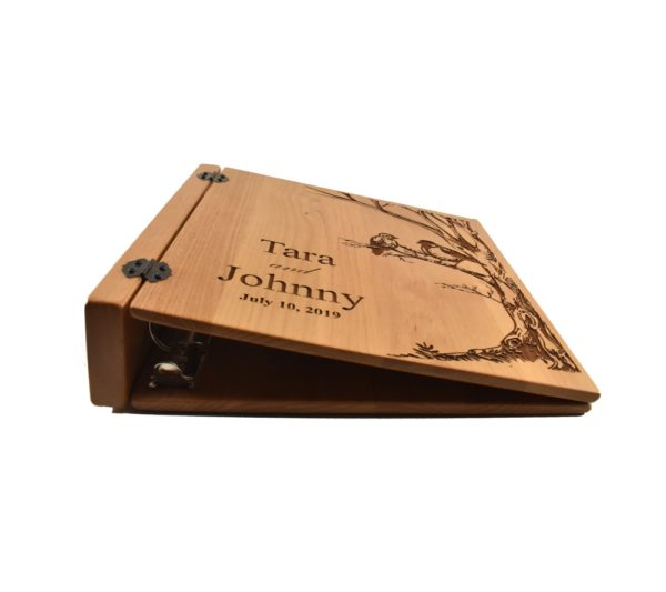 Personalized three ring wooden photo album.