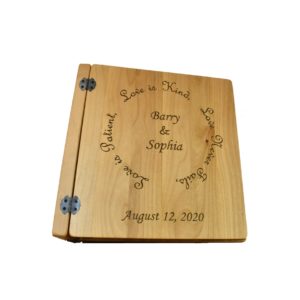 Personalized three ring wooden photo album.