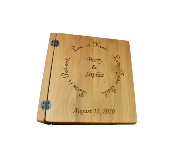 Personalized three ring wooden photo album.