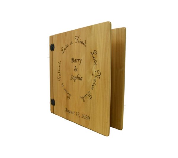 Personalized three ring wooden photo album.