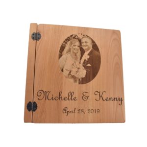 Custom engraved wooden photo album cover.