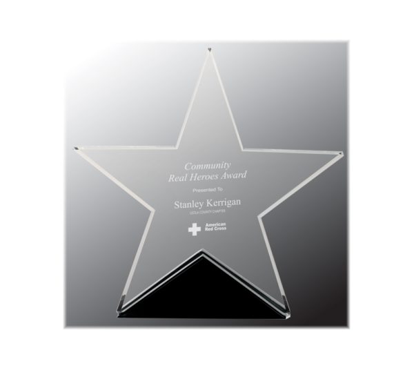 Glass star on a black base engraved as an award.