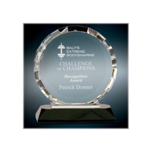 Custom engraved, round faceted award on a black base.