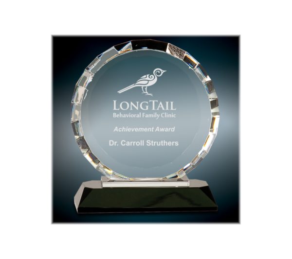 Custom engraved, round faceted award on a black base.