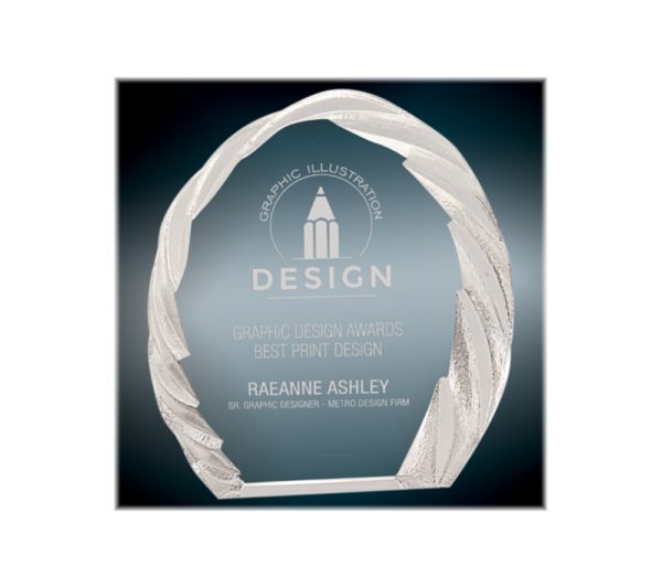 Rounded crystal award with decorative edge.