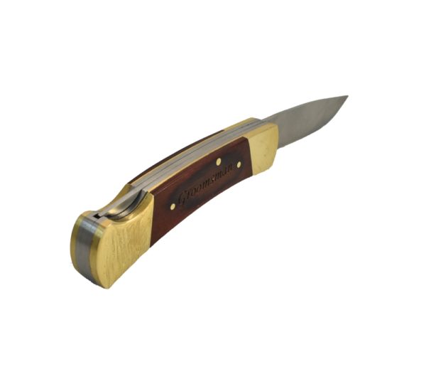 Lockback pocket knife with a custom engraved handle.