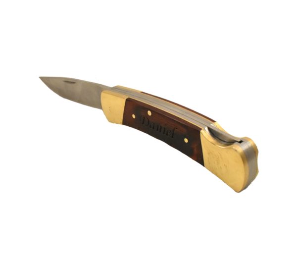 Lockback pocket knife with a custom engraved handle.