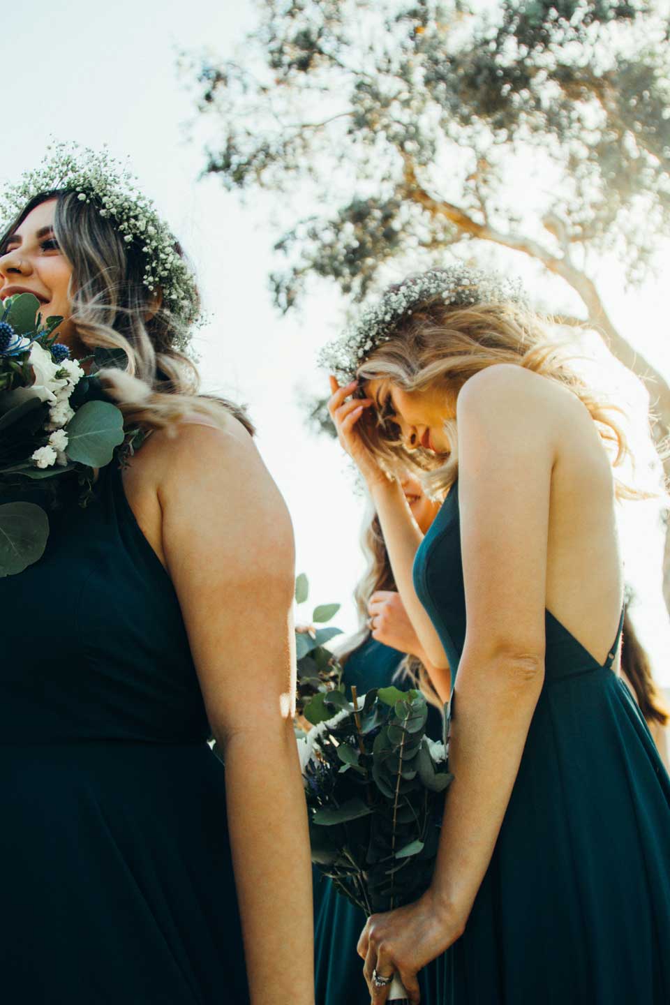 bridesmaids in green outside